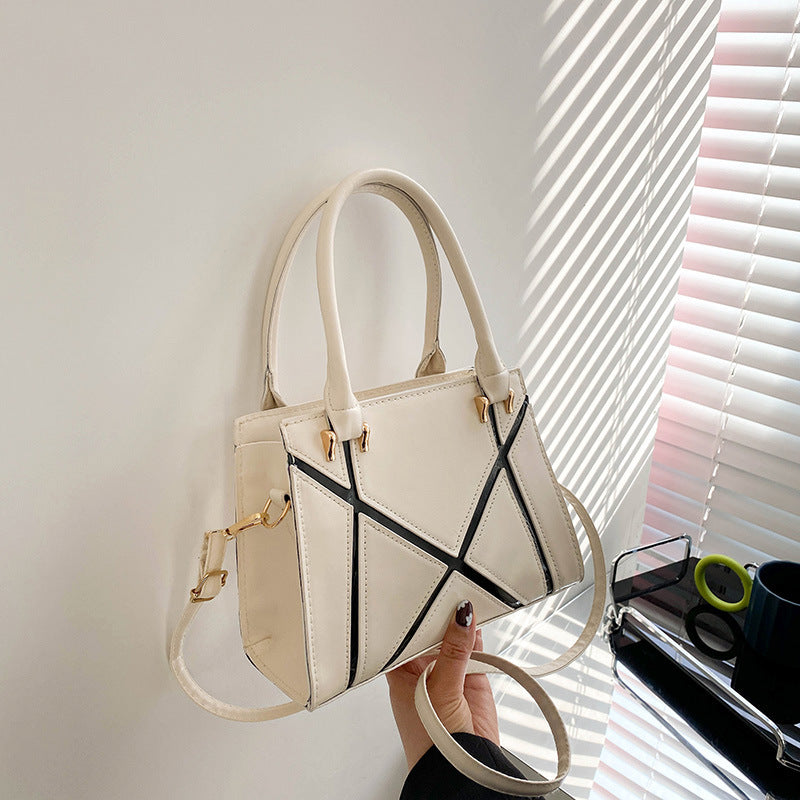 Beige handbag with black accents square Crossbody Bag