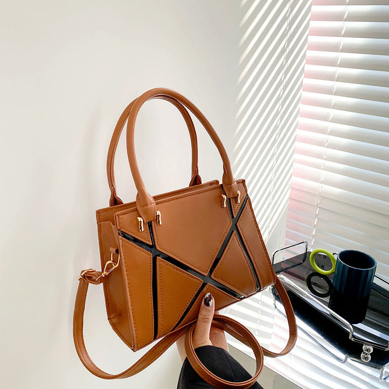 Beige handbag with black accents square Crossbody Bag