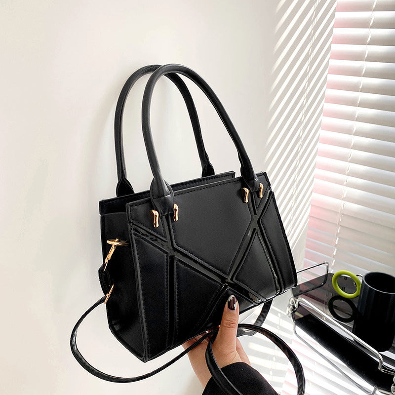 Beige handbag with black accents square Crossbody Bag