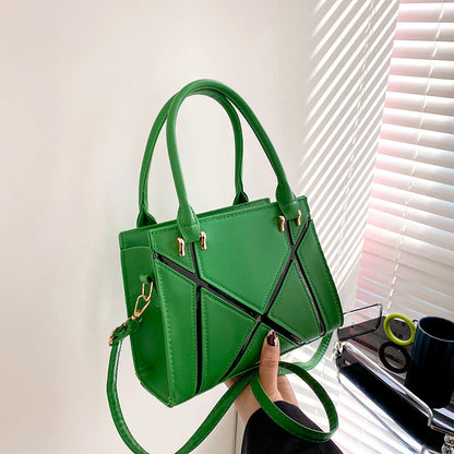 Beige handbag with black accents square Crossbody Bag