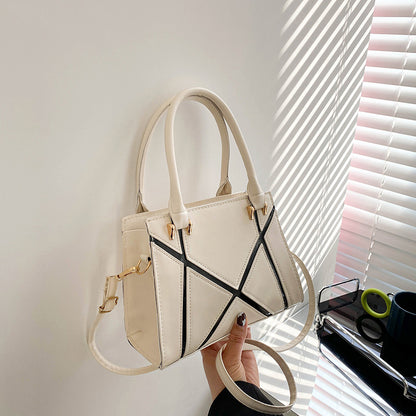 Beige handbag with black accents square Crossbody Bag