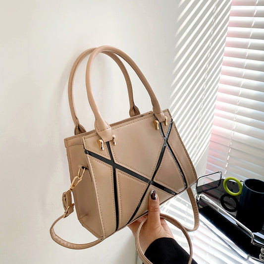 Beige handbag with black accents square Crossbody Bag